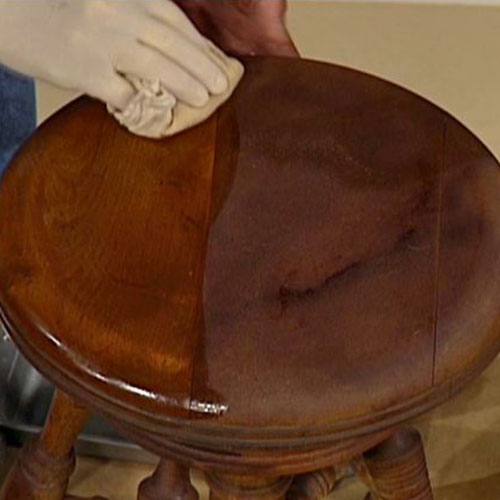 polishing old wood furniture